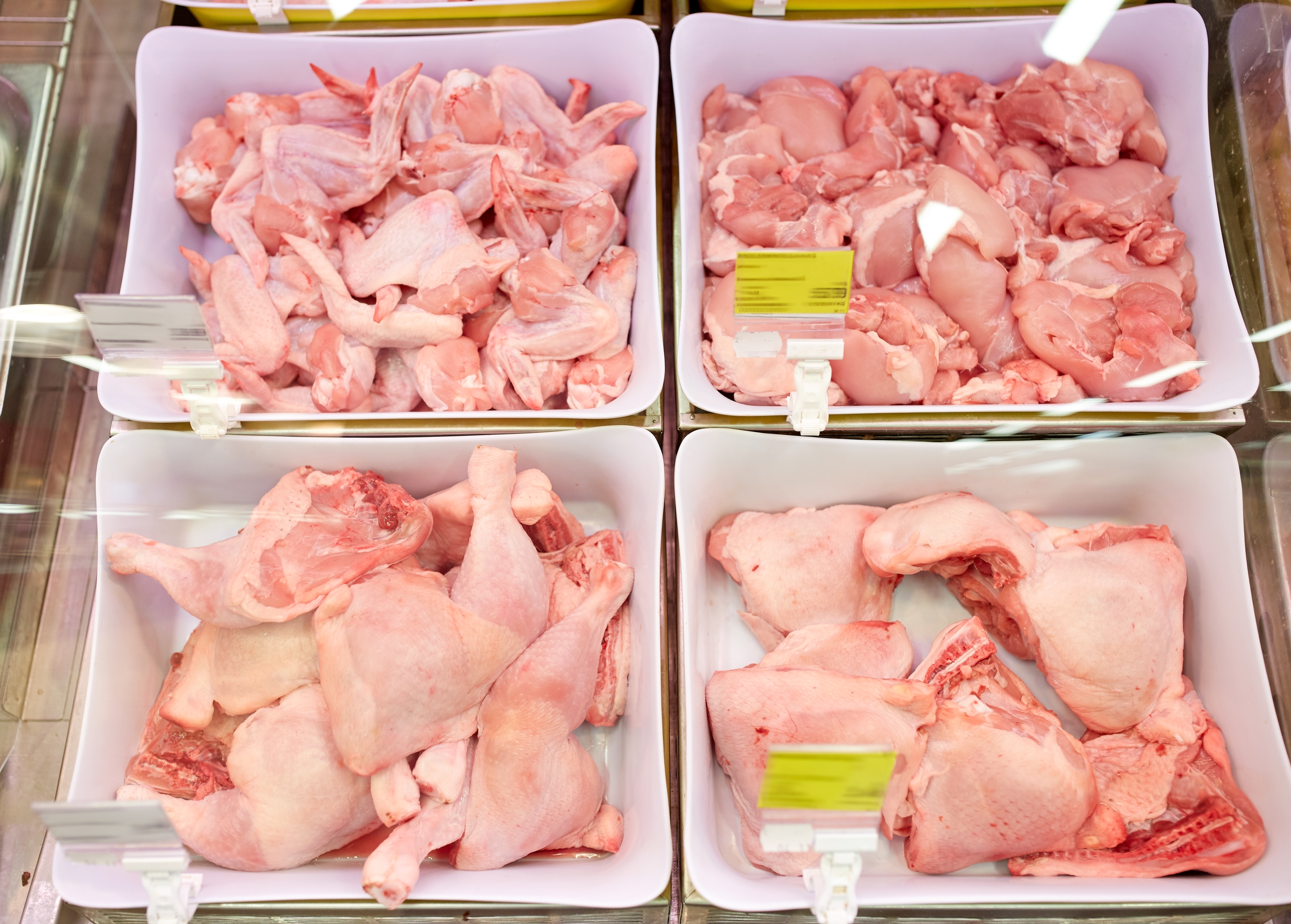 poultry-meat-in-bowls-at-grocery-stall-2022-12-16-09-36-48-utc